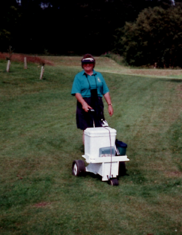 Margaret with ‘goodies’ for team and caddies! Photo courtesy of Maggie McPherson