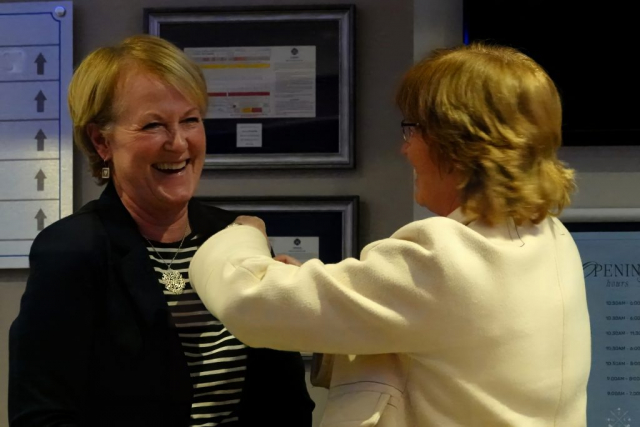 Isla McCrone receiving her Past Captain brooch
